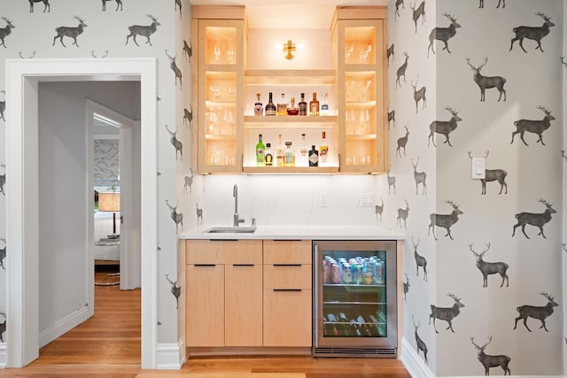 343 Washington Ave, Wilmette, IL 60091 - indoor wet bar featuring beverage cooler and light wood-type flooring