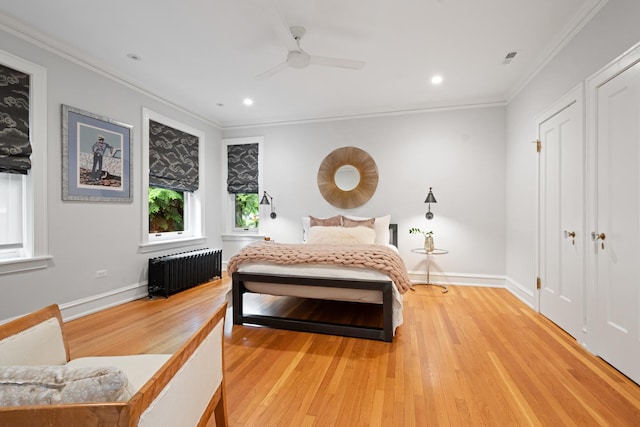 343 Washington Ave, Wilmette, IL 60091 - bedroom with radiator heating unit, crown molding, light wood-style floors, recessed lighting, and a ceiling fan