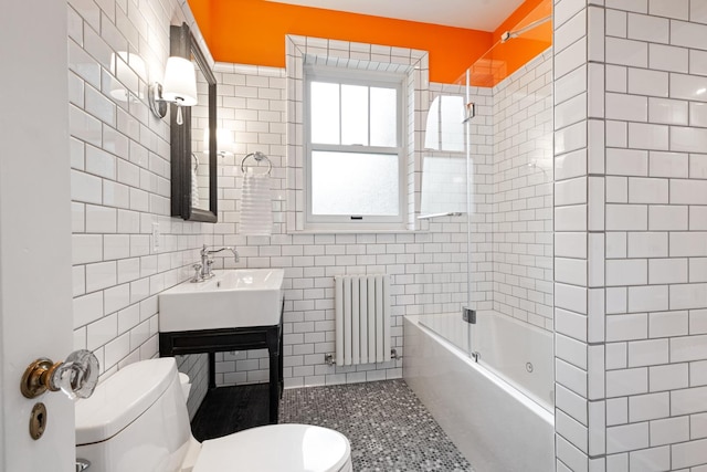 343 Washington Ave, Wilmette, IL 60091 - full bathroom with radiator, enclosed tub / shower combo, and tile walls