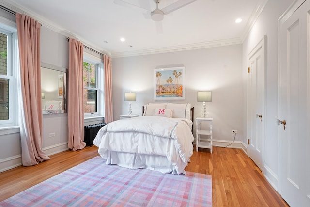 343 Washington Ave, Wilmette, IL 60091 - bedroom featuring radiator heating unit, crown molding, light wood-style floors, ceiling fan, and recessed lighting