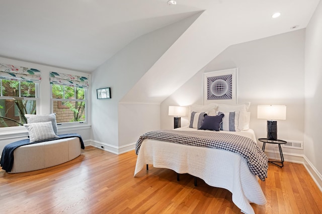 343 Washington Ave, Wilmette, IL 60091 - bedroom with light wood-style floors, vaulted ceiling, and recessed lighting