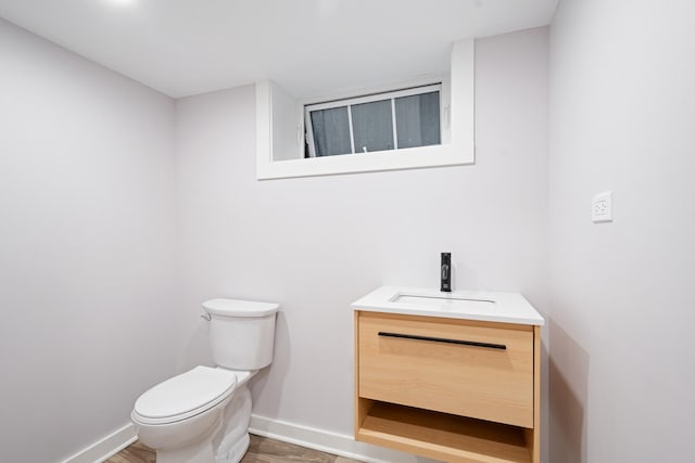 343 Washington Ave, Wilmette, IL 60091 - half bath with vanity and wood finished floors