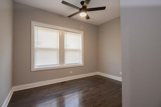 8930 S Throop St, Chicago, IL 60620 - empty room with dark wood finished floors and a ceiling fan
