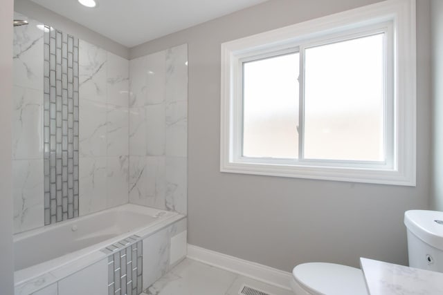 8930 S Throop St, Chicago, IL 60620 - bathroom with marble look tiles, vanity, and shower / bath combination