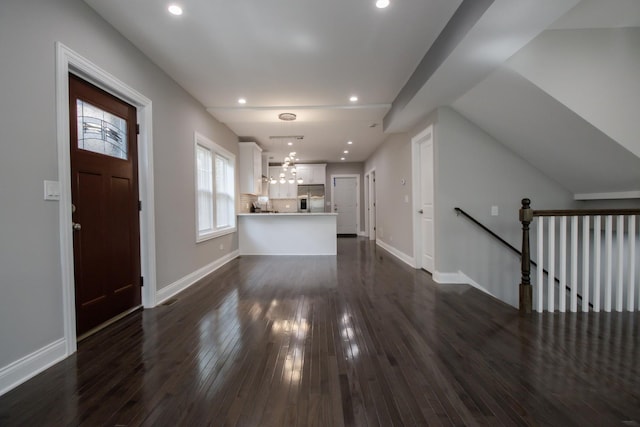 8930 S Throop St, Chicago, IL 60620 - unfurnished living room featuring dark wood-style floors and recessed lighting
