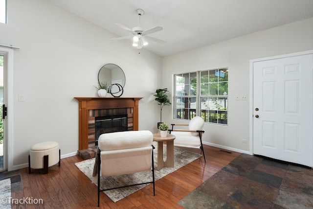1827 Appaloosa Dr, Naperville, IL 60565 - sitting room featuring a brick fireplace, ceiling fan, wood finished floors, and high vaulted ceiling