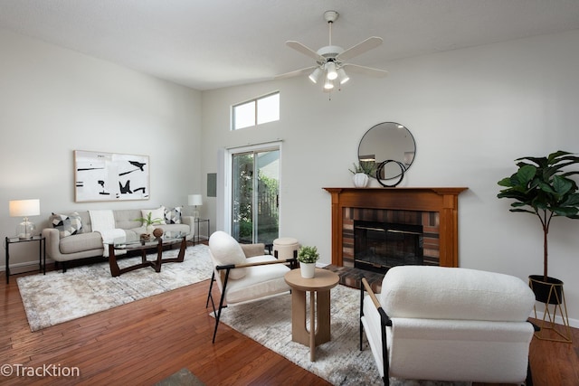 1827 Appaloosa Dr, Naperville, IL 60565 - living area featuring wood finished floors, a high ceiling, a fireplace, and a ceiling fan