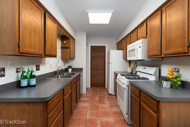 1827 Appaloosa Dr, Naperville, IL 60565 - kitchen featuring white appliances, backsplash, brown cabinets, dark countertops, and light tile patterned floors