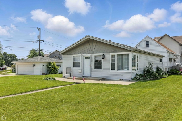5301 State Rd, Burbank, IL 60459 - view of front of house with a front yard, a garage, and an outdoor structure