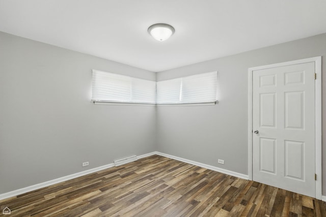 5301 State Rd, Burbank, IL 60459 - unfurnished room featuring wood finished floors and baseboards
