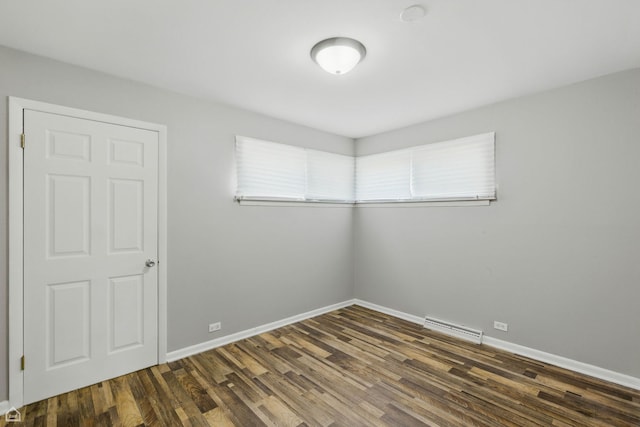 5301 State Rd, Burbank, IL 60459 - empty room with wood finished floors and baseboards