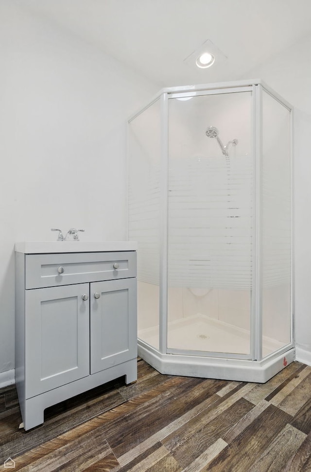 5301 State Rd, Burbank, IL 60459 - full bath featuring a shower stall, wood finished floors, and vanity