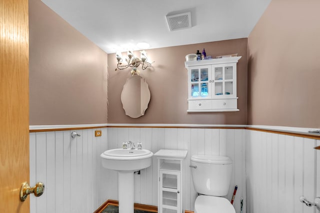 11254 S Whipple St, Chicago, IL 60655 - half bathroom with toilet and wainscoting