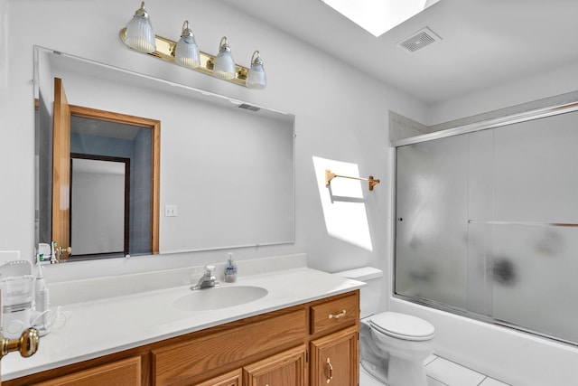 11254 S Whipple St, Chicago, IL 60655 - bathroom featuring vanity, bath / shower combo with glass door, and tile patterned flooring