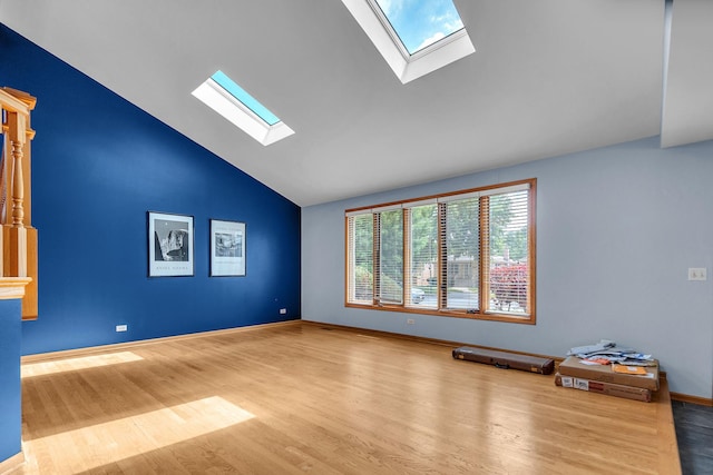 11254 S Whipple St, Chicago, IL 60655 - spare room with a skylight, wood finished floors, and high vaulted ceiling