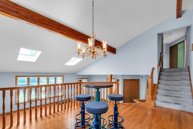 11254 S Whipple St, Chicago, IL 60655 - dining room with a skylight, wood finished floors, and a chandelier