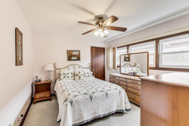 5836 S Menard Ave, Chicago, IL 60638 - bedroom with light carpet and ceiling fan