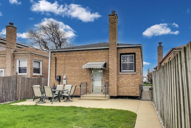 5836 S Menard Ave, Chicago, IL 60638 - rear view of house featuring a patio area and brick siding