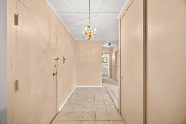 1139 Leavitt Ave Unit 313, Flossmoor, IL 60422 - corridor featuring a chandelier, light tile patterned floors, and crown molding