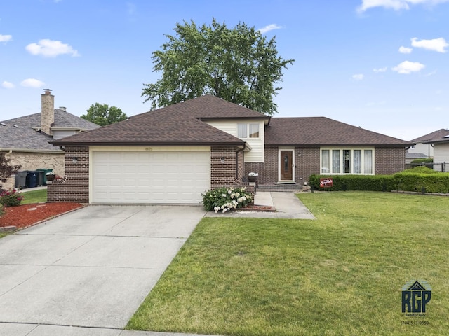 8825 Abbey Ln, Orland Park, IL 60462 - tri-level home featuring brick siding, an attached garage, a front yard, and concrete driveway