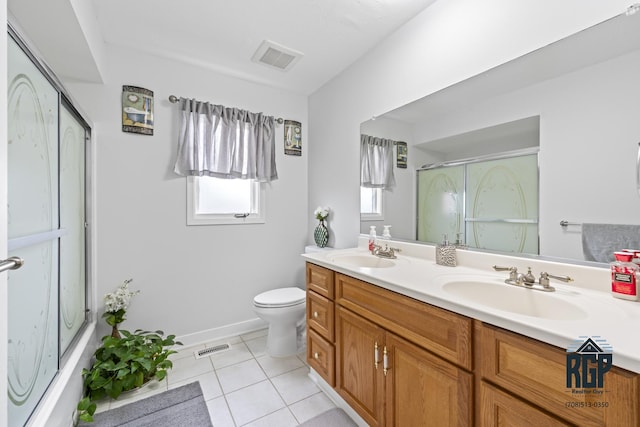 8825 Abbey Ln, Orland Park, IL 60462 - bathroom with double vanity, an enclosed shower, and tile patterned flooring
