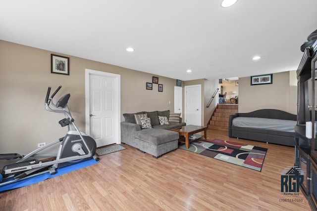 8825 Abbey Ln, Orland Park, IL 60462 - living room with wood finished floors, stairway, and recessed lighting