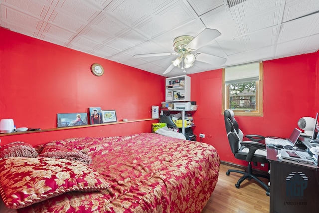 8825 Abbey Ln, Orland Park, IL 60462 - bedroom with wood finished floors, ceiling fan, and an office area