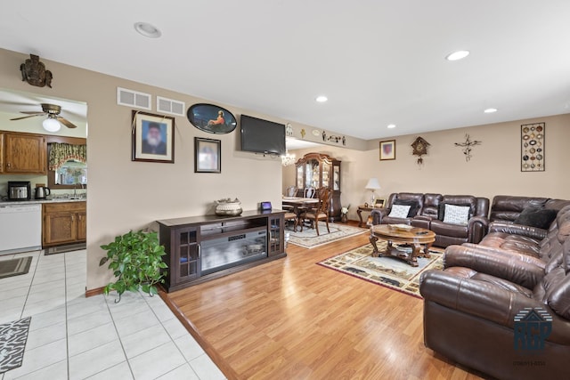 8825 Abbey Ln, Orland Park, IL 60462 - living area featuring recessed lighting, a ceiling fan, and light tile patterned floors