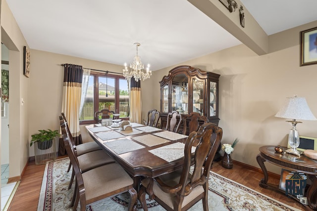 8825 Abbey Ln, Orland Park, IL 60462 - dining space with a chandelier and wood finished floors