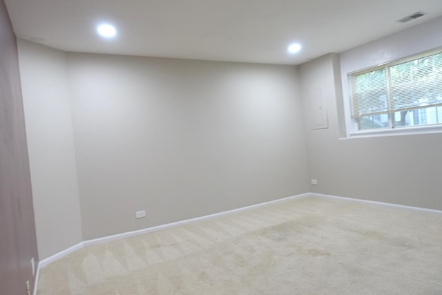 1653 Geneva Dr, Wheeling, IL 60090 - spare room with light colored carpet and recessed lighting