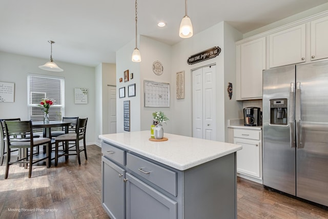 26065 S White Oak Trl, Channahon, IL 60410 - kitchen featuring stainless steel refrigerator with ice dispenser, gray cabinetry, dark wood-type flooring, white cabinetry, and hanging light fixtures