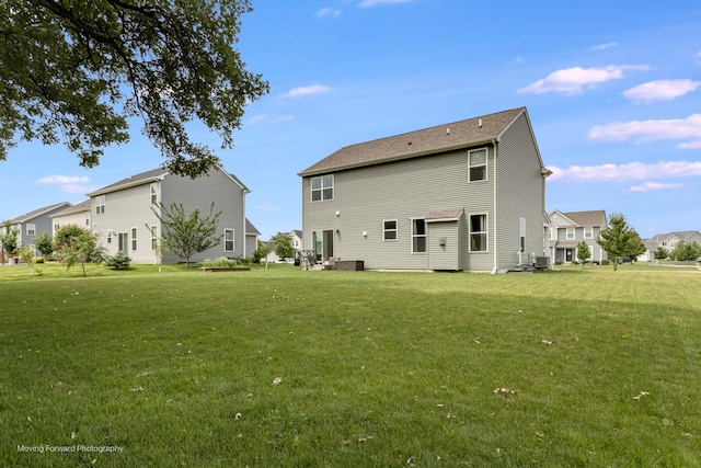 26065 S White Oak Trl, Channahon, IL 60410 - back of property featuring a lawn and a residential view