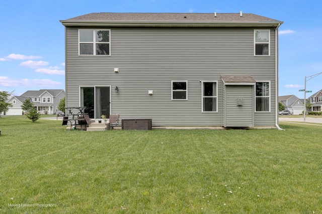 26065 S White Oak Trl, Channahon, IL 60410 - back of house with a lawn
