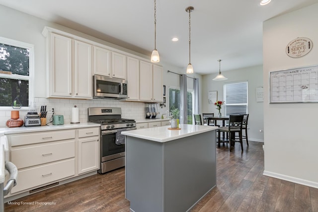 26065 S White Oak Trl, Channahon, IL 60410 - kitchen featuring stainless steel appliances, recessed lighting, backsplash, dark wood finished floors, and white cabinets