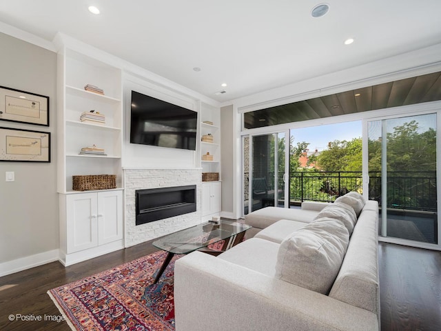 1841 N Sheffield Ave Unit 2, Chicago, IL 60614 - living area featuring a fireplace, built in shelves, dark wood-style floors, and recessed lighting