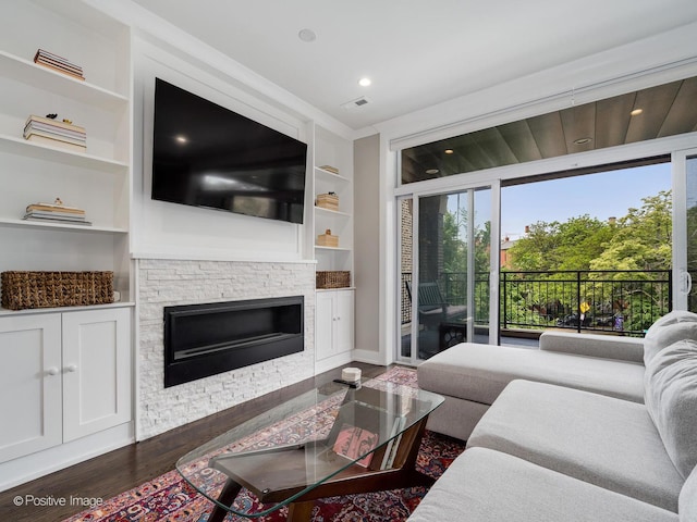 1841 N Sheffield Ave Unit 2, Chicago, IL 60614 - living area featuring built in shelves, dark wood-style floors, a fireplace, and recessed lighting