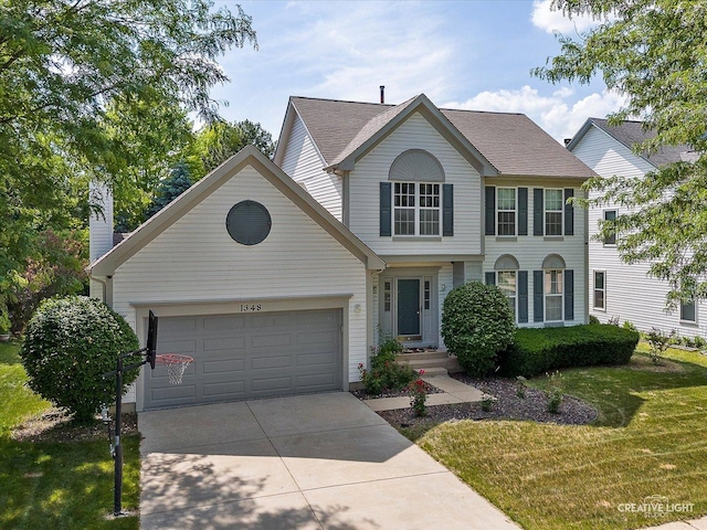 1348 Amaranth Dr, Naperville, IL 60564 - view of front of home featuring a garage, concrete driveway, a front yard, and a shingled roof
