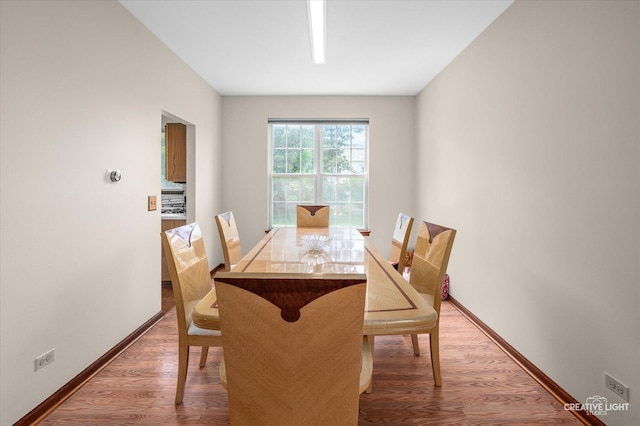 1348 Amaranth Dr, Naperville, IL 60564 - dining area with baseboards and wood finished floors