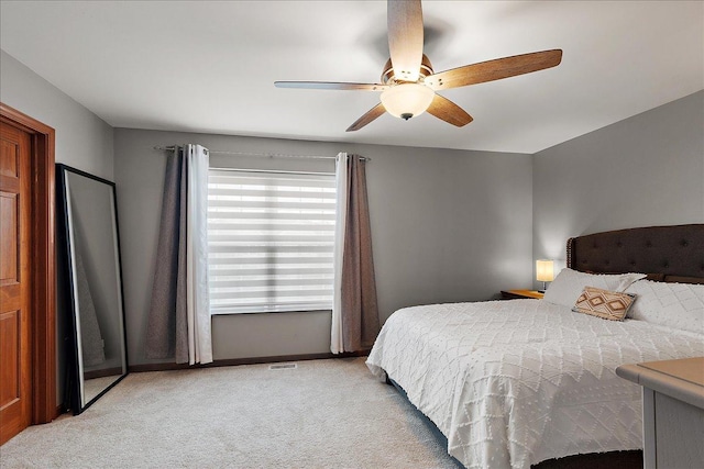 2447 Saddle Ridge Dr, Joliet, IL 60432 - bedroom featuring light colored carpet and a ceiling fan