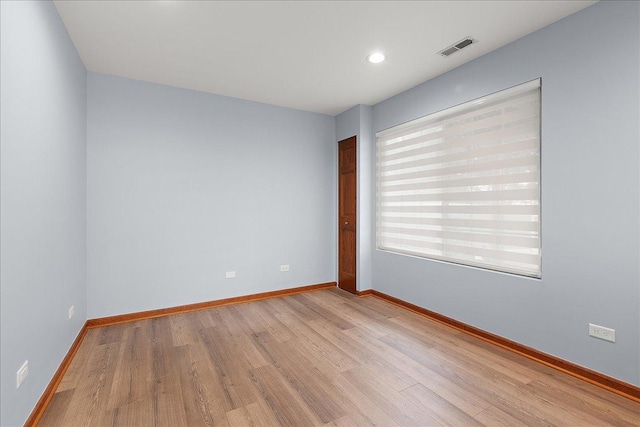 2447 Saddle Ridge Dr, Joliet, IL 60432 - unfurnished room featuring light wood-style flooring and recessed lighting