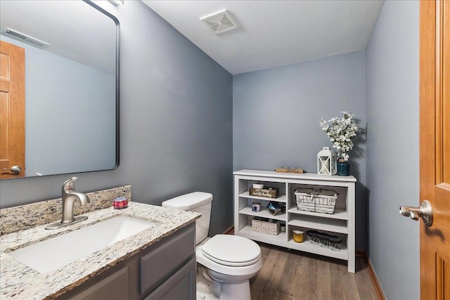 2447 Saddle Ridge Dr, Joliet, IL 60432 - half bathroom with wood finished floors and vanity