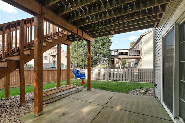 2447 Saddle Ridge Dr, Joliet, IL 60432 - fenced backyard with a patio area, a playground, and stairway