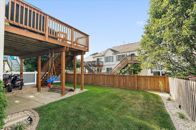 2447 Saddle Ridge Dr, Joliet, IL 60432 - fenced backyard with stairway, a deck, and a residential view