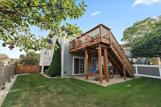 2447 Saddle Ridge Dr, Joliet, IL 60432 - rear view of property featuring a fenced backyard, a wooden deck, a patio area, and stairway