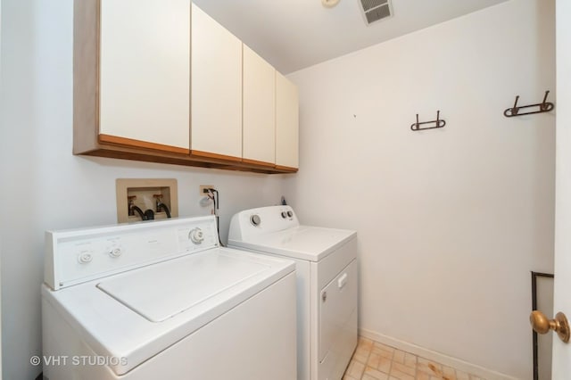 1257 Ballantrae Pl Unit C, Mundelein, IL 60060 - laundry room with cabinet space and independent washer and dryer
