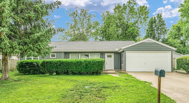 724 Dover Pl, Champaign, IL 61820 - single story home with driveway, an attached garage, a front lawn, and board and batten siding