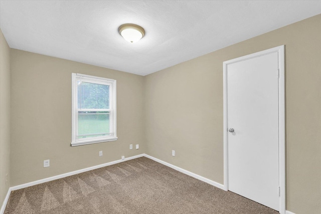 724 Dover Pl, Champaign, IL 61820 - carpeted spare room featuring baseboards