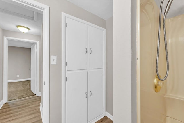 724 Dover Pl, Champaign, IL 61820 - hallway with baseboards and light wood-type flooring