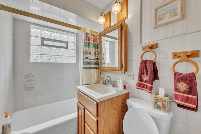 4512 S Trumbull Ave, Chicago, IL 60632 - full bathroom with vanity, tile walls, and shower / bath combo with shower curtain