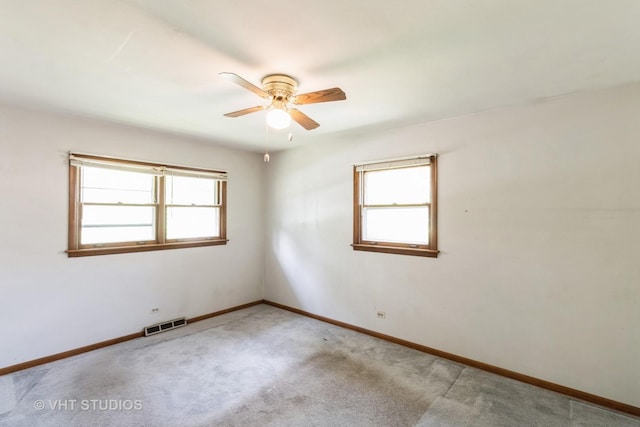 5341 Grand Ave, Downers Grove, IL 60515 - spare room featuring healthy amount of natural light, a ceiling fan, and carpet floors
